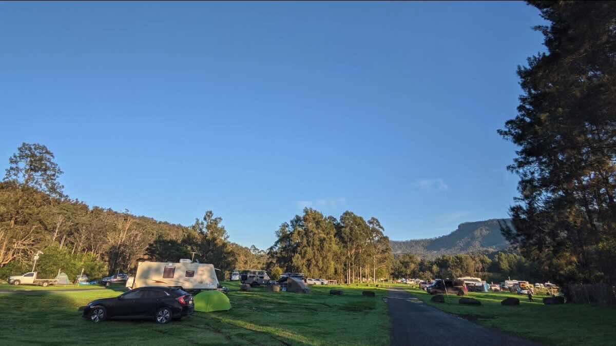 Create Wordpress HTML/CSS full width page using black text, text containers all to be 1 column full width, all features using standard bullets, write SEO title, Below Title write SEO 300-550 word description article au English spelling, write name and address, if available show website, show supplied gps coordinate, use full address location prompt and supplied gps coordinate to set GPS coordinates set width="600" height="450" set to satellite display, location, site suitable for, road access, site surface, camping permitted, maximum overnight stays, if available show number of powered sites, if available show number of un-powered sites, facilities, picnic tables, potable water, mobile phone coverage, tv reception, onsite public toilets, only if available show ullage, only if available show drive through, rubbish bins, open fires, generator use, number of sites available, essentials to bring, pet friendly, fishing, short walks, create Local Amenities, name and approximate distance to 3 local pubs, name and approximate distance to places to eat, name and approximate distance to local attractions, name and approximate distance to nearest caravan parks, name and approximate distance to next Free Camps, name and approximate distance nearest dump points, name and approximate distance to nearest petrol station, name and approximate distance to drinking water resupply, name and approximate distance to public toilets, create heading and show seasonal weather forecast: Bendeela Recreation Area, Kangaroo Valley NSW 2577. -34.73988, 150.47153